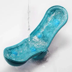 Open Flip Orb sleeve being rinsed under running water, showing easy-clean design