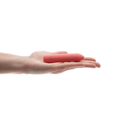 Open palm holding ILY The Bullet vibrator to show compact travel-friendly size