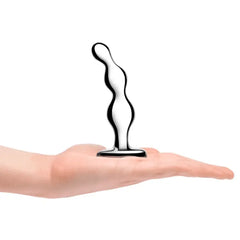 Open palm holding metal anal beads upright, illustrating lightweight, hand-sized scale