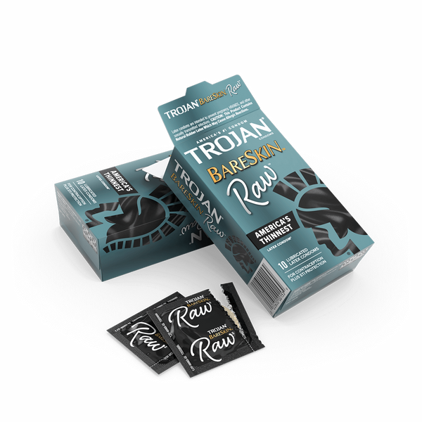 Open Trojan BareSkin Raw box showing inner tray and two individually wrapped lubricated latex condoms