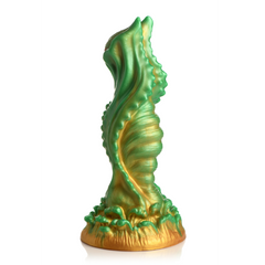 Opposite side view of green gold alien dildo highlighting spiral ridges and flowing fins