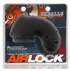 Oxballs Airlock chastity cage in original retail packaging highlighting PLUS-silicone material