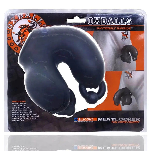 Oxballs Meatlocker full-cover chastity device in black, shown in retail blister packaging