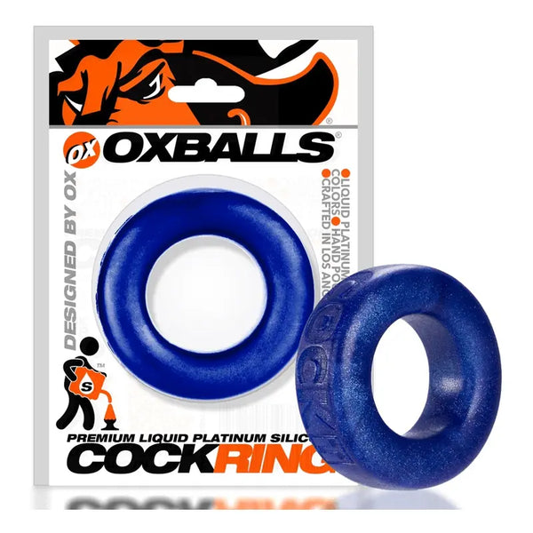 Oxballs COCK-T blueballs cockring displayed beside packaging to show product scale and color