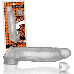 Oxballs Dicker clear penis sleeve beside retail packaging, showing full product contents