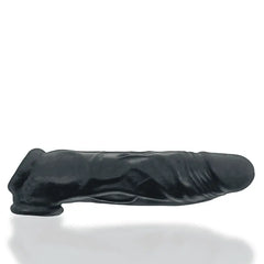 Oxballs Dicker cocksheath in black ice silicone, side profile view showing realistic texture