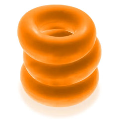 Oxballs Fat Willy jumbo cock rings stacked in a set of three, orange silicone