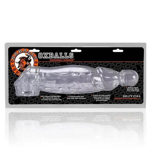 OXBALLS Butch clear cock sheath displayed in retail packaging with feature callouts