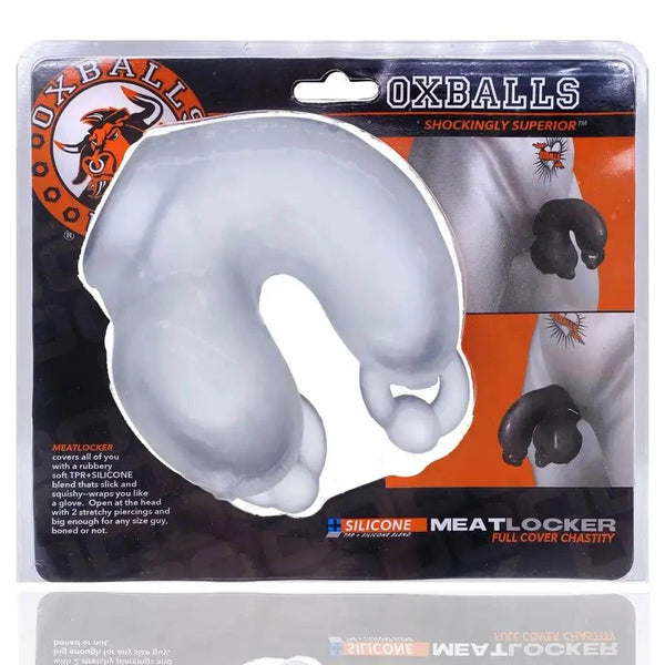 Oxballs Meatlocker full-cover chastity device in clear, shown in retail blister packaging