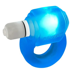 Oxballs Glowdick cock ring glowing blue with LED light activated, side angle view