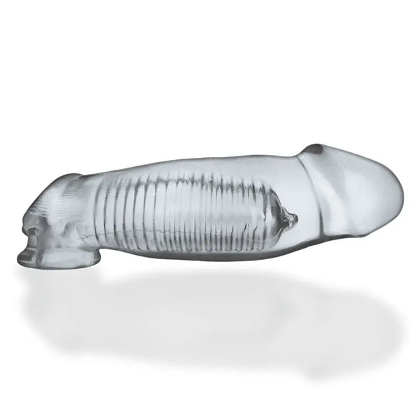 Oxballs HULK clear cock sheath lying flat, showing ribbed shaft texture in flexible TPR material