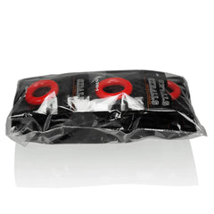 Oxballs OXR-1 20-pack bulk bag lying flat, red cock rings visible through clear packaging