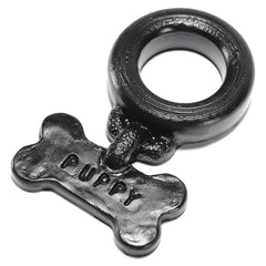 Oxballs Puppy Silicone Cockring in black with embossed bone-shaped charm tag
