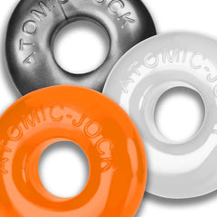 Oxballs Ringer Max cock rings in orange, clear, and steel, flat donut shape, PLUS-TPR material