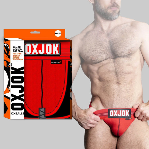OXBALLS SLINGJOCK red jock with bold waistband label, shown with retail packaging