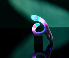 Paradise Illumination Rabbit glowing with multicolour LED light effects on dark background