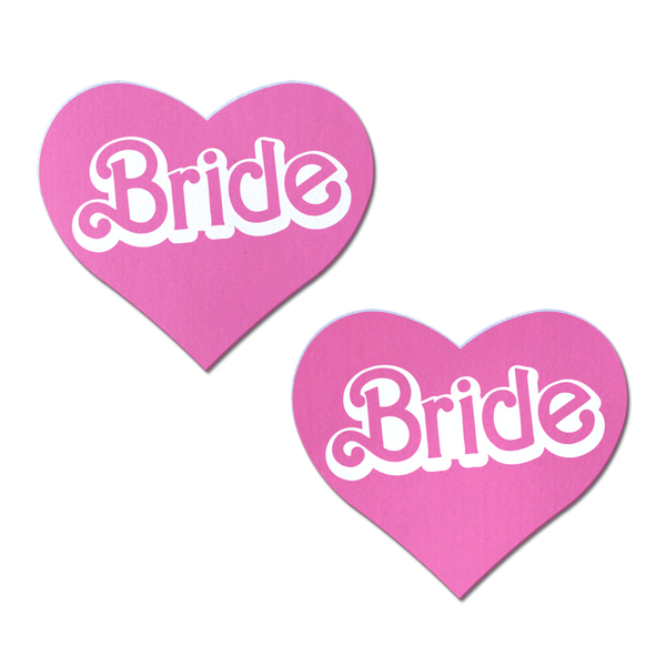 Pastease Bride pink heart-shaped pasties, pair shown flat, white retro doll-style lettering