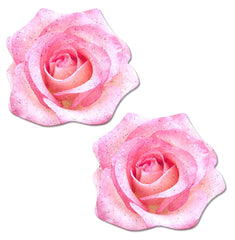Pastease pink glitter rose pasties shown as a pair, petal-shaped with soft pink tones and shimmer detail
