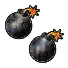 Pastease Toon Bomb pasties pair, holographic black finish with lit orange star fuse detail