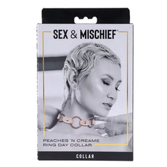 Peaches N CreaMe Ring Day Collar packaging showing product name and model wearing the collar