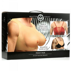Perky Pair D-Cup Silicone Breasts retail packaging showing front and styled lifestyle insets