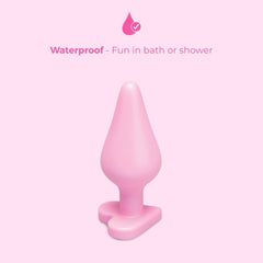 Pink b-Vibe B-Mine anal plug standing upright with waterproof feature callout