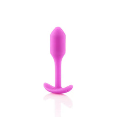 Pink b-Vibe Snug Plug 1 side profile highlighting slim neck and curved anchor base