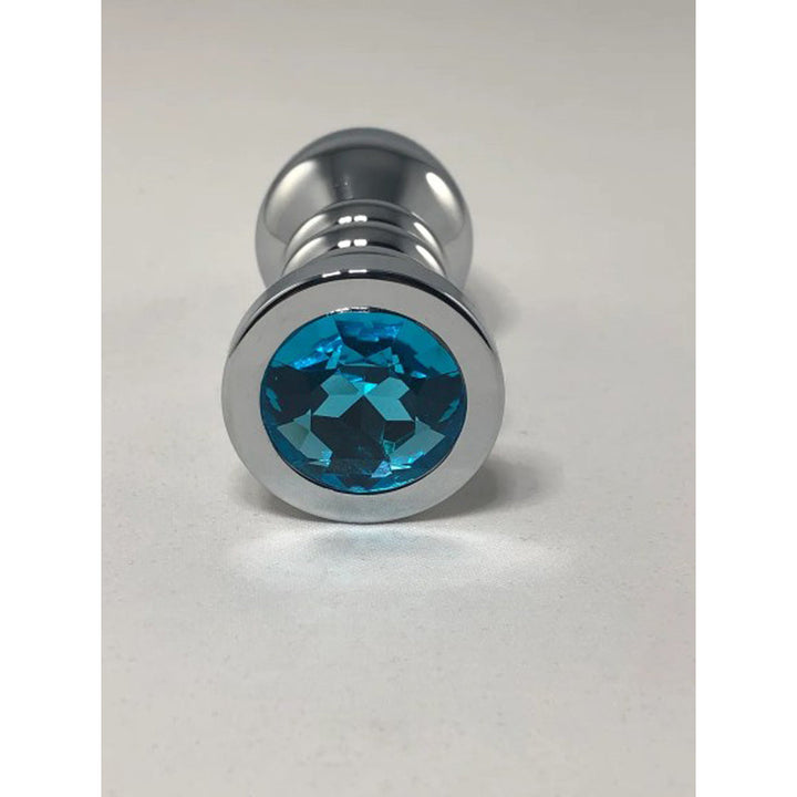 Pink Elephant Butt Plug Silver Bullet Large, front view showing aqua blue faceted crystal base