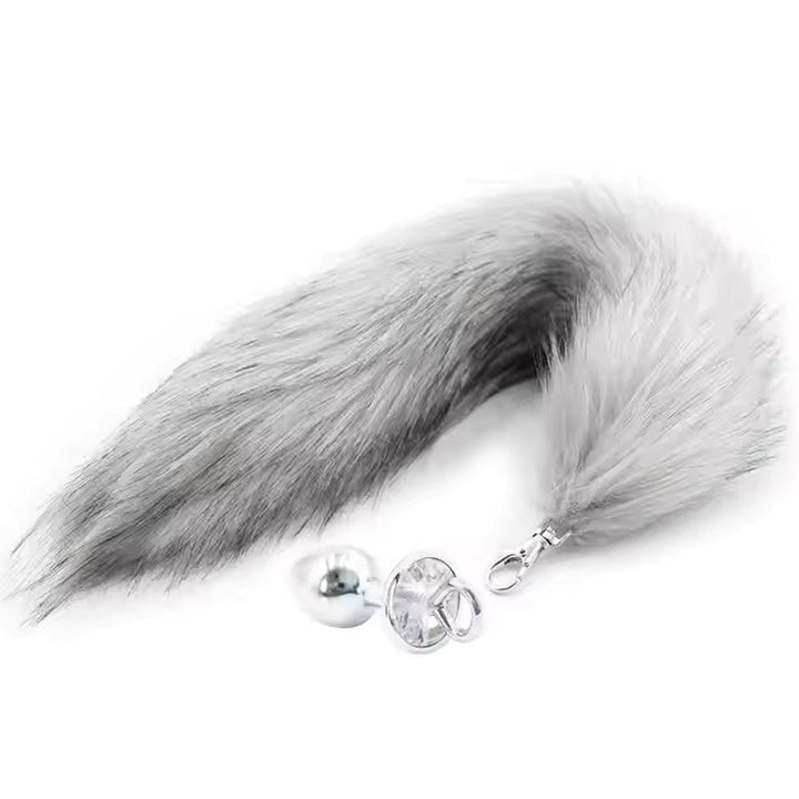 Pink Elephant Faux Fox Tail with Detachable Plug in grey, featuring a fluffy faux-fur tail and crystal-accented base