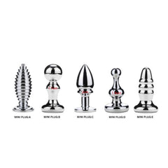 Pink Elephant Mini Plug Set showing five silver stainless steel anal plugs labeled A through E with varying shapes