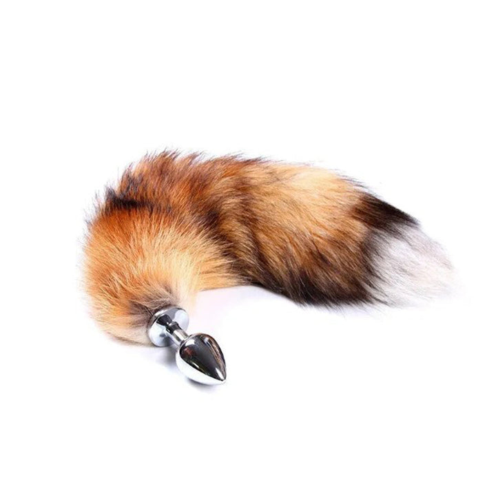 Pink Elephant Real Fox Tail Plug Small in brown, featuring fluffy natural fur tail and polished silver metal base.
