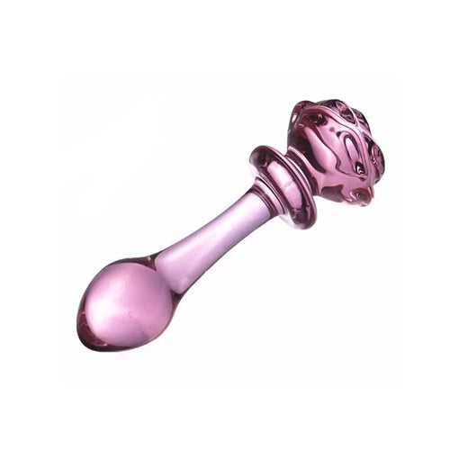 Pink Elephant Rose Glass Dildo in pink, featuring a decorative floral handle and smooth rounded base