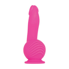 Pink silicone dildo rear angle revealing textured swirl pattern on base with suction cup