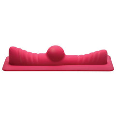 Pink silicone nubbed saddle attachment with central stimulation bead for the Saddle Pro machine