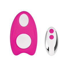 Pink silicone Under the Radar panty vibrator beside its silver wireless remote control