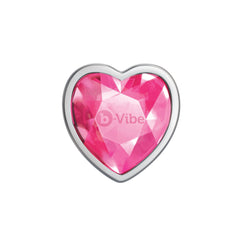 Close-up of pink topaz heart-shaped jewel base with faceted crystal detail and b-Vibe logo