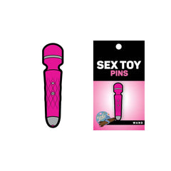 Pink wand massager enamel pin beside its black Sex Toy Pins retail card packaging