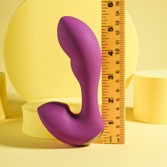 Playboy Arch vibrator beside ruler showing approximately 5-inch insertable length