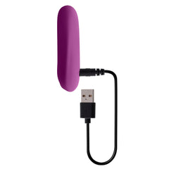Playboy Bullet vibrator connected to USB magnetic charging cable, showing rechargeable functionality