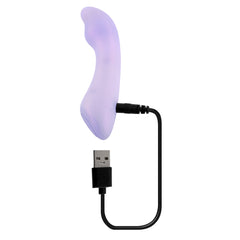 Playboy Euphoria vibrator connected to USB magnetic charging cable, ready to charge