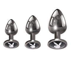 Playboy Pleasure 3 Ways gunmetal butt plug set in small, medium, and large sizes