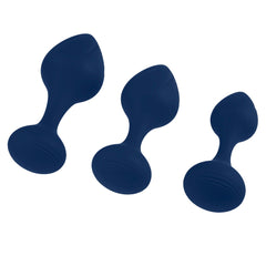 Playboy Tail Trainer plugs showing ribbed suction base detail in deep navy velvet-finish silicone