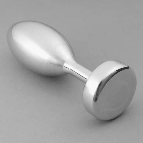 Polished silver metal butt plug with round flat base, smooth tapered body