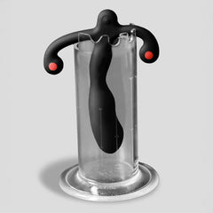 Prostate massager submerged inside the Aneros Soaker clear acrylic cleaning cylinder