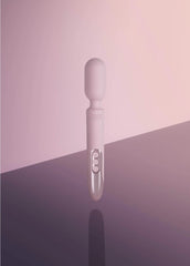 Prowand pink wand massager on reflective surface showing full silhouette without LED lit