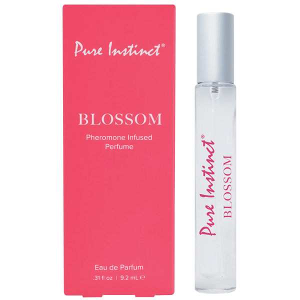 Pure Instinct Blossom pheromone-infused perfume roller in clear 9.2 mL pen with pink box