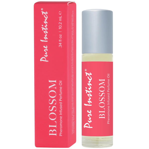 Pure Instinct Blossom roll-on perfume oil in pink packaging, 10.2 mL glass bottle
