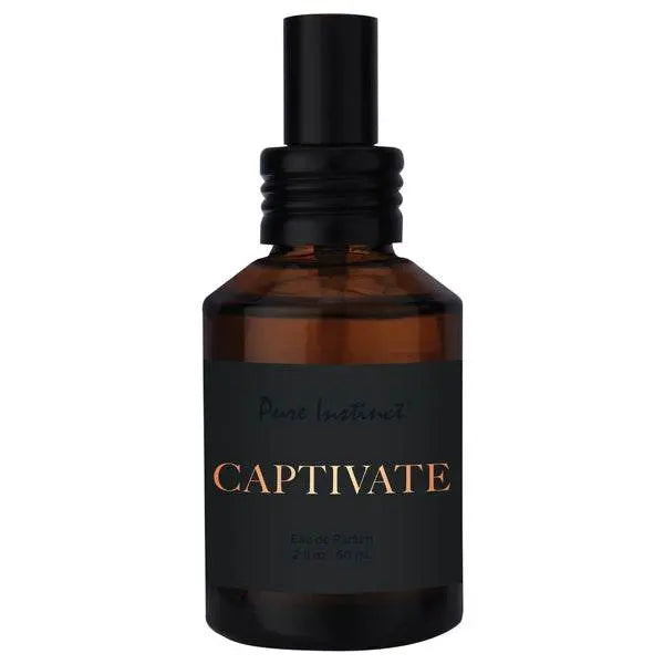 Pure Instinct Captivate 2 fl oz amber glass spray bottle shown alone on white background