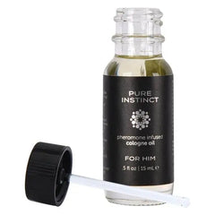 Pure Instinct cologne oil bottle open with dropper applicator removed, showing precision tip wand