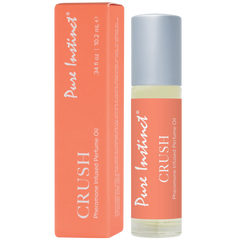 Pure Instinct Crush roll-on perfume oil in coral packaging, 10.2 ml glass bottle with roller tip
